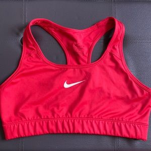 Nike red-orange sports bra.